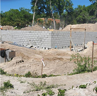 a picture of a CMU wall under construction